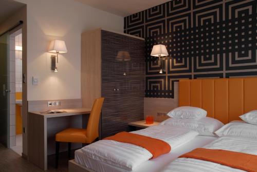 Cama o camas de una habitación en Gokart Hotel