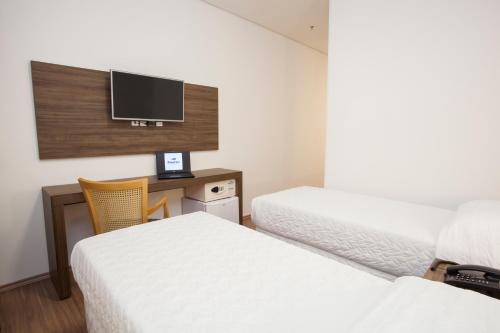 Cama o camas de una habitación en Travel Inn Bras