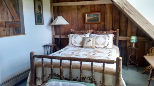 Ένα ή περισσότερα κρεβάτια σε δωμάτιο στο Lodge at Millstone Hill