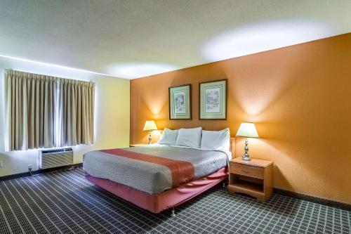 Ένα ή περισσότερα κρεβάτια σε δωμάτιο στο Motel 6-Grand Rapids, MI - Northeast
