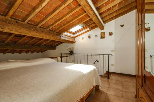 Postel nebo postele na pokoji v ubytování Agriturismo Olmi Grossi