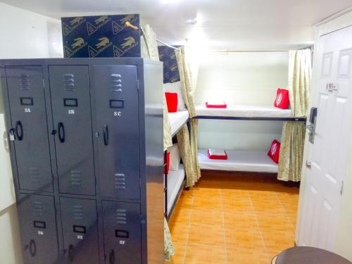 Una cama o camas en una habitación de 8Hostel
