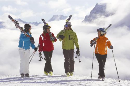 a group of people standing on top of a mountain at Apartment Aschaber in Waidring