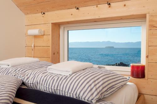 Postel nebo postele na pokoji v ubytování Tungulending Guesthouse