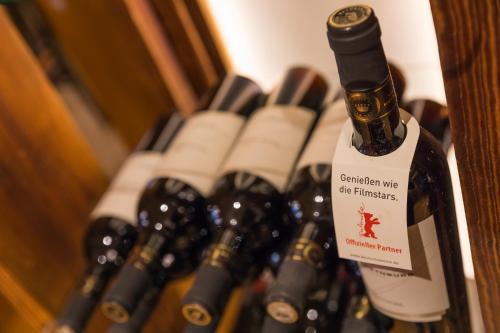 a bunch of bottles of wine are lined up at Landgasthof Rebstock in Ottenhöfen