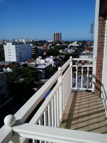 a balcony with a view of a city at Panoramico Playa Grande -Solo Familias in Mar del Plata