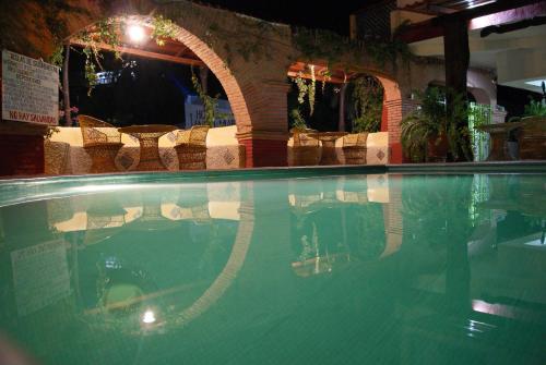 Πισίνα στο ή κοντά στο Hotel La Cabaña