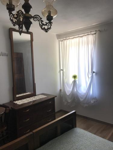 Ένα ή περισσότερα κρεβάτια σε δωμάτιο στο Casa Paolina - CIPAT 57814
