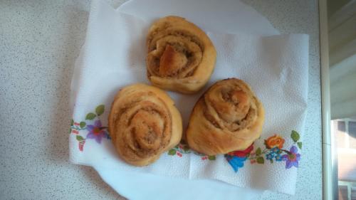 three cinnamon rolls sitting on a paper towel at Studio apartment Meli in Ogulin