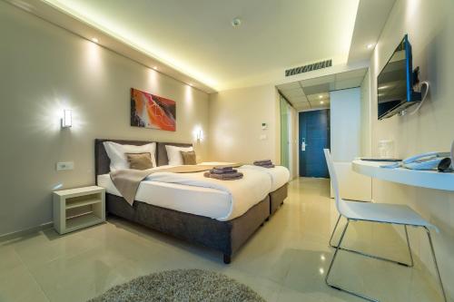 Postel nebo postele na pokoji v ubytování Laki Hotel & Spa