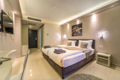 Postel nebo postele na pokoji v ubytování Laki Hotel & Spa