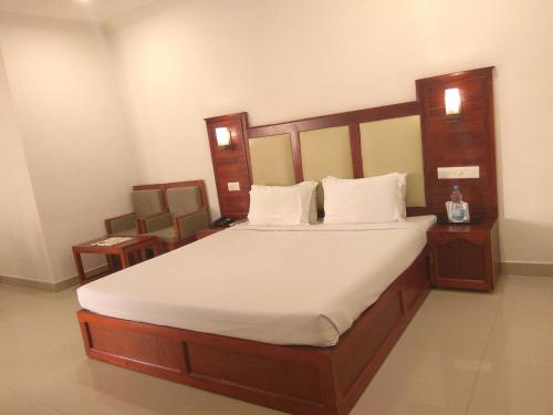Postel nebo postele na pokoji v ubytování Hotel Sandra Palace