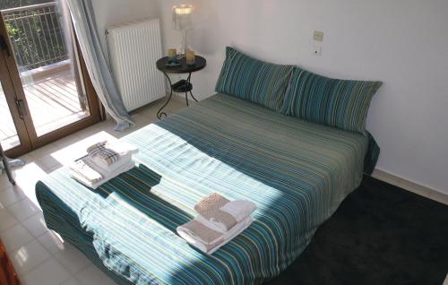 Säng eller sängar i ett rum på Villa Markos