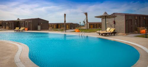 Bazén v ubytování Fade Hotel by La Hacienda Ras Sudr nebo v jeho okolí