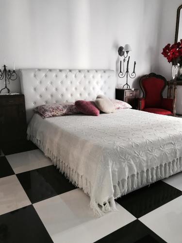Katil atau katil-katil dalam bilik di B&B dell'orologio