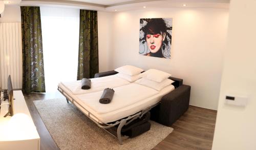 Postel nebo postele na pokoji v ubytování Apartment GoodMood2 with free parking