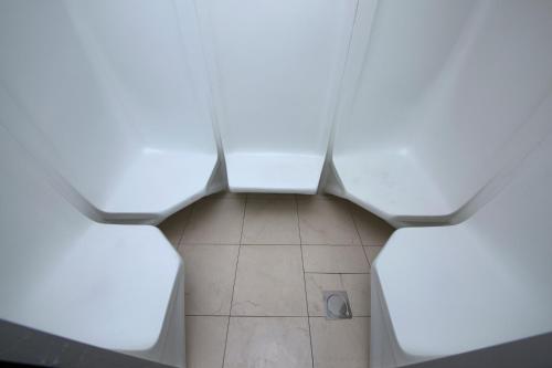 a view of a bathroom with two toilets at Best Western Plus Pearl Creek in Dubai