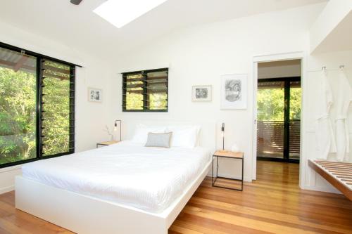 En eller flere senge i et værelse på Tallaringa Views