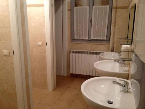 Ванная комната в Ostello Angolo Verde
