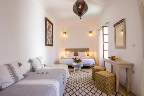 Llit o llits en una habitació de Riad Amira