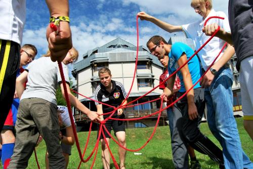 a group of people playing with hula hoops at Hellmut-Waßmer-Jugendherberge Lörrach in Lörrach