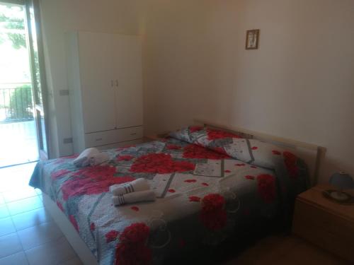 Ein Bett oder Betten in einem Zimmer der Unterkunft Donnabella House