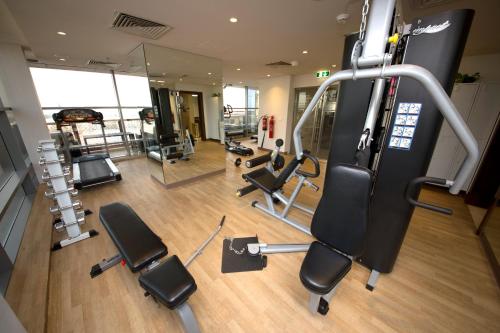 an overhead view of a gym with cardio equipment at Best Western Plus Pearl Creek in Dubai