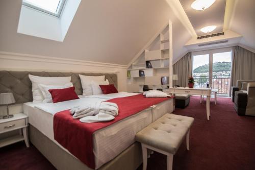 Postel nebo postele na pokoji v ubytování Hotel Central Park