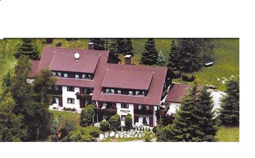 a large house with a red roof at Haus Heidelberg in Feldberg
