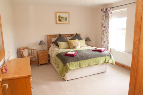 Voodi või voodid majutusasutuse Roe Valley Cottage - LA Spa Hot Tub toas