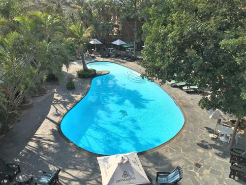 Вид на бассейн в Salt Rock Hotel and Beach Resort или окрестностях