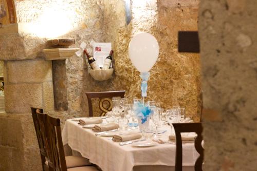 a table with a balloon sitting on top of it at Villa Cosilinum in Padula