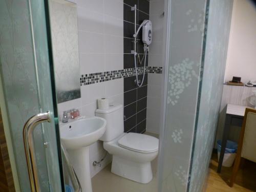 Ванная комната в Hotel 138 @ Bestari