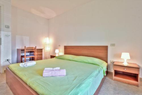 Postel nebo postele na pokoji v ubytování Apartment Katarina