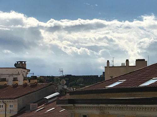 a view of roofs of buildings in a city at Angel in Trieste