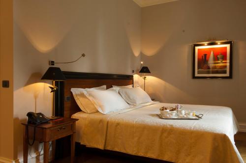 Letto o letti in una camera di Villa Necchi alla Portalupa