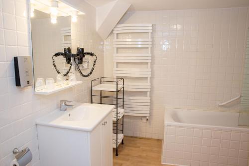 Koupelna v ubytování Appart Hotel Charles Sander