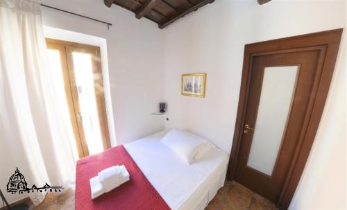 Cama o camas de una habitación en Borgo Pio 91