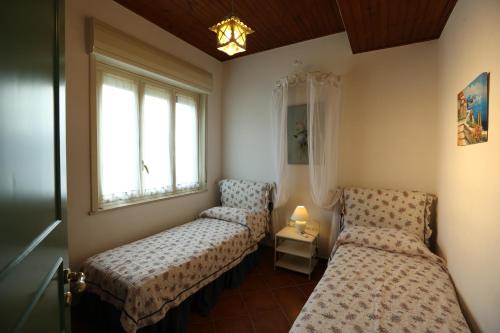Postel nebo postele na pokoji v ubytování Ancora Bianca Beach Residence