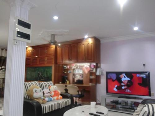 TV a/nebo společenská místnost v ubytování Shuang Yang Sekinchan Homestay 7