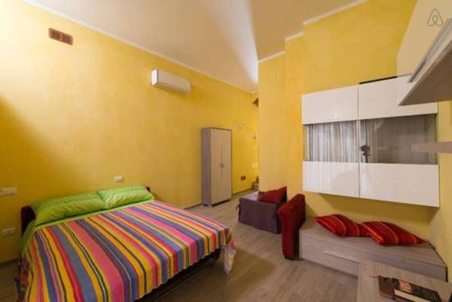 A bed or beds in a room at Maisonrua'