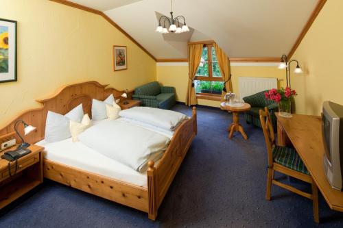 Posteľ alebo postele v izbe v ubytovaní Gasthof Schwarz