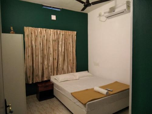 Postel nebo postele na pokoji v ubytování CL Dreams Homestay