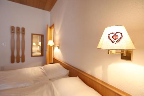 Postel nebo postele na pokoji v ubytování Hotel Concordia