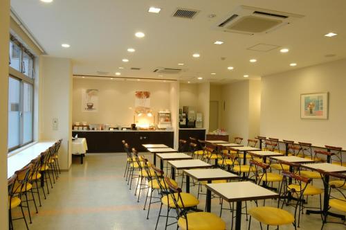 Ресторант или друго място за хранене в Hotel Econo Tsu Station