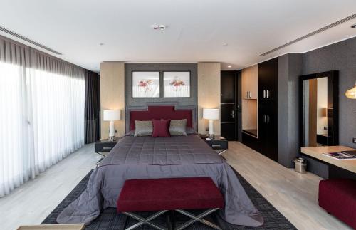 Ένα ή περισσότερα κρεβάτια σε δωμάτιο στο Mia City Hotel