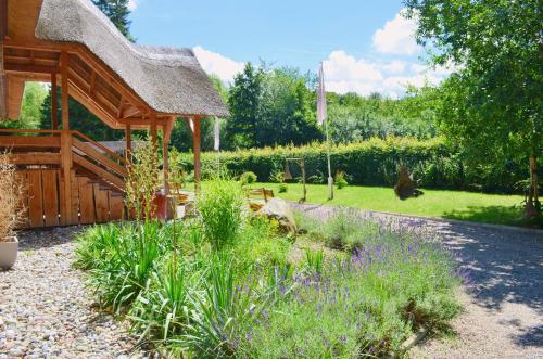 A garden outside Lodge Seaside Boutique Hotel