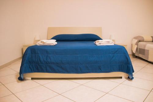 Säng eller sängar i ett rum på Twinsuite