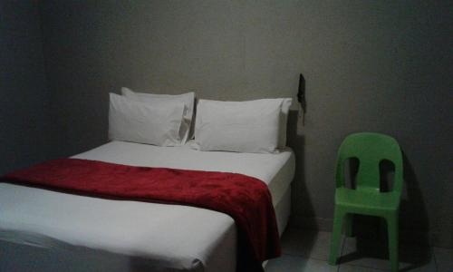 Lova arba lovos apgyvendinimo įstaigoje Central Lodge Hotels