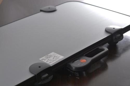 a close up of a charger on a laptop computer at Value the Hotel Ishinomaki in Ishinomaki